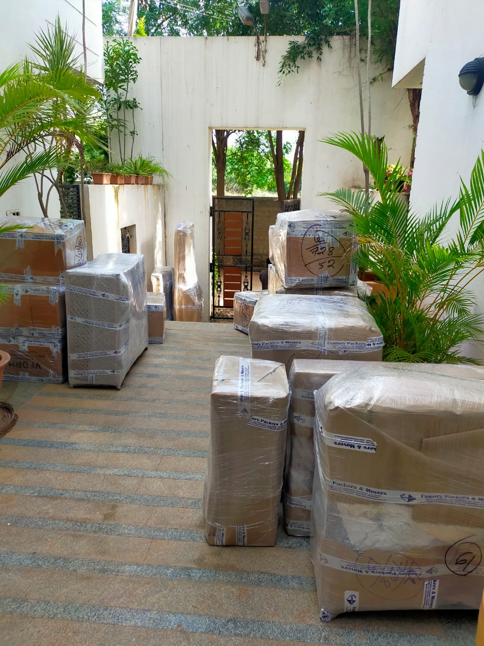 Office shifting Bangalore to Pune with packed office furniture and equipment